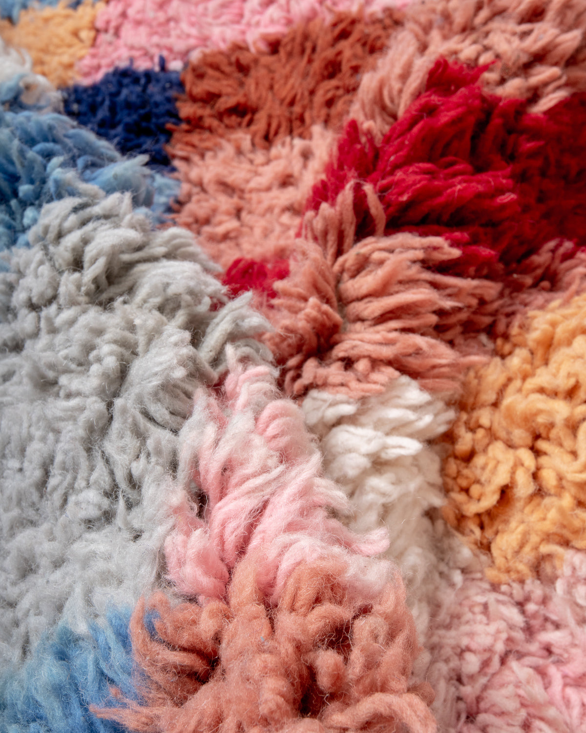 Modern, designer, handcrafted Berber rug from Morocco. Beniourain carpet with beautiful colours and patterns and fluffy wool texture.